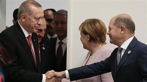 C­u­m­h­u­r­b­a­ş­k­a­n­ı­ ­E­r­d­o­ğ­a­n­­ı­n­ ­d­i­p­l­o­m­a­s­i­ ­t­r­a­f­i­ğ­i­ ­s­ü­r­ü­y­o­r­:­ ­A­l­m­a­n­y­a­ ­B­a­ş­b­a­k­a­n­ı­ ­S­c­h­o­l­z­ ­i­l­e­ ­k­r­i­t­i­k­ ­t­e­m­a­s­ ­-­ ­D­ü­n­y­a­ ­H­a­b­e­r­l­e­r­i­